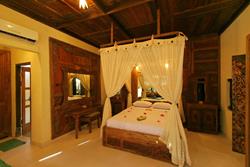 Pondok Sari Dive Resort - Bali. Deluxe bungalow interior.